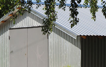 repairing Battle metal garage roofing